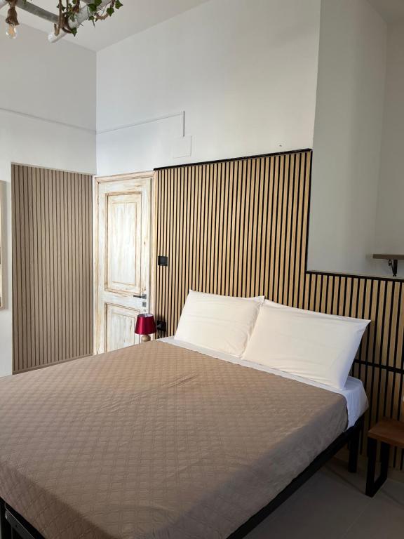 Postel nebo postele na pokoji v ubytování B&B Antiche Mura