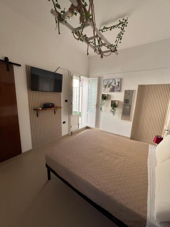 Postel nebo postele na pokoji v ubytování B&B Antiche Mura
