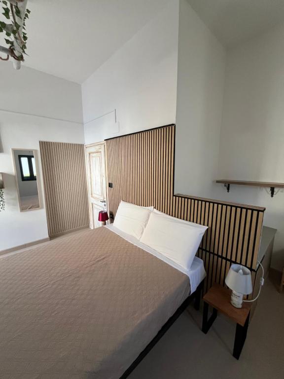 Postel nebo postele na pokoji v ubytování B&B Antiche Mura