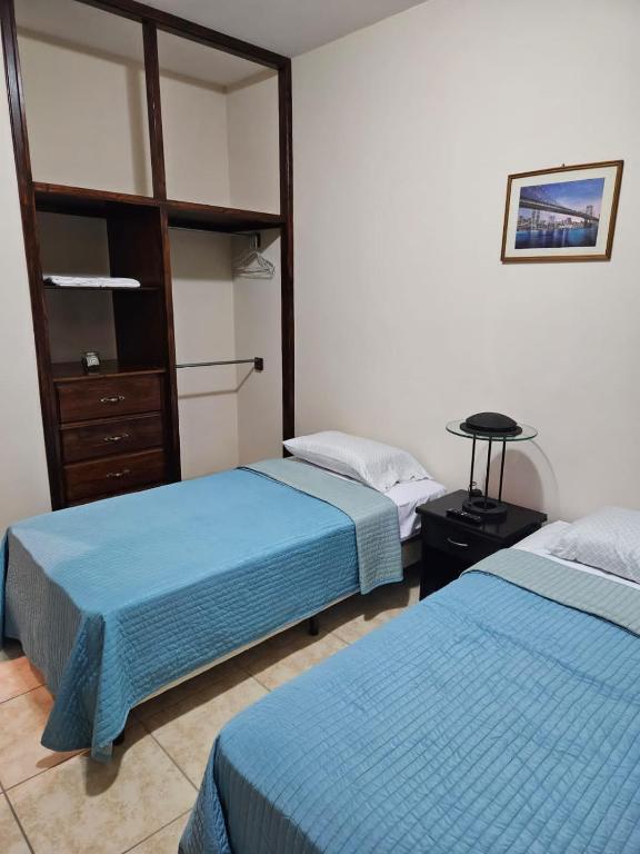 Postel nebo postele na pokoji v ubytování Villa Isabel