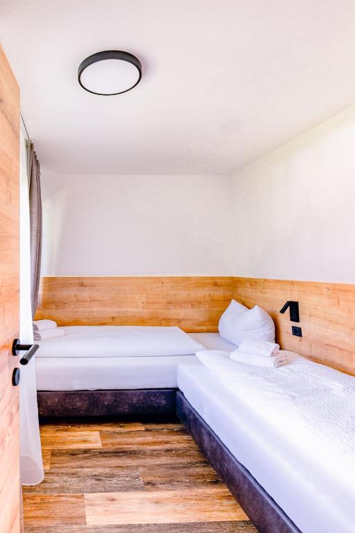 Posteľ alebo postele v izbe v ubytovaní Appartements Landhaus Waidmannsheil