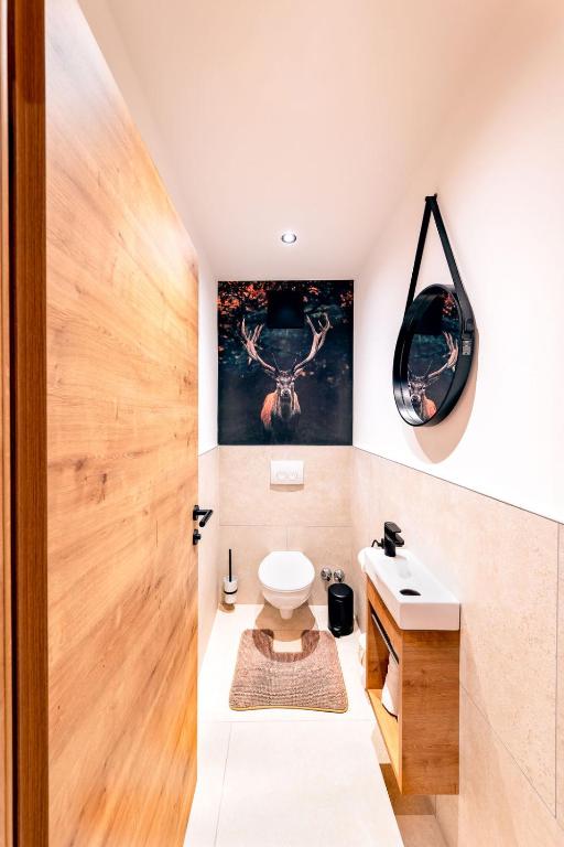 Kúpeľňa v ubytovaní Appartements Landhaus Waidmannsheil