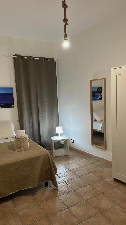 Postel nebo postele na pokoji v ubytování Domus Mea Apartments