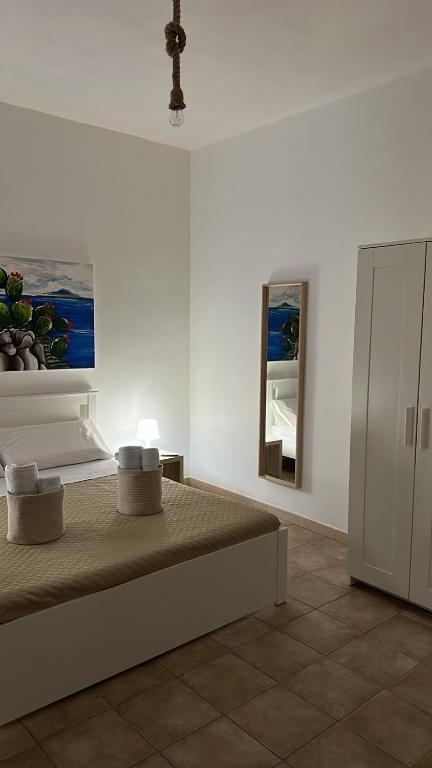 Postel nebo postele na pokoji v ubytování Domus Mea Apartments