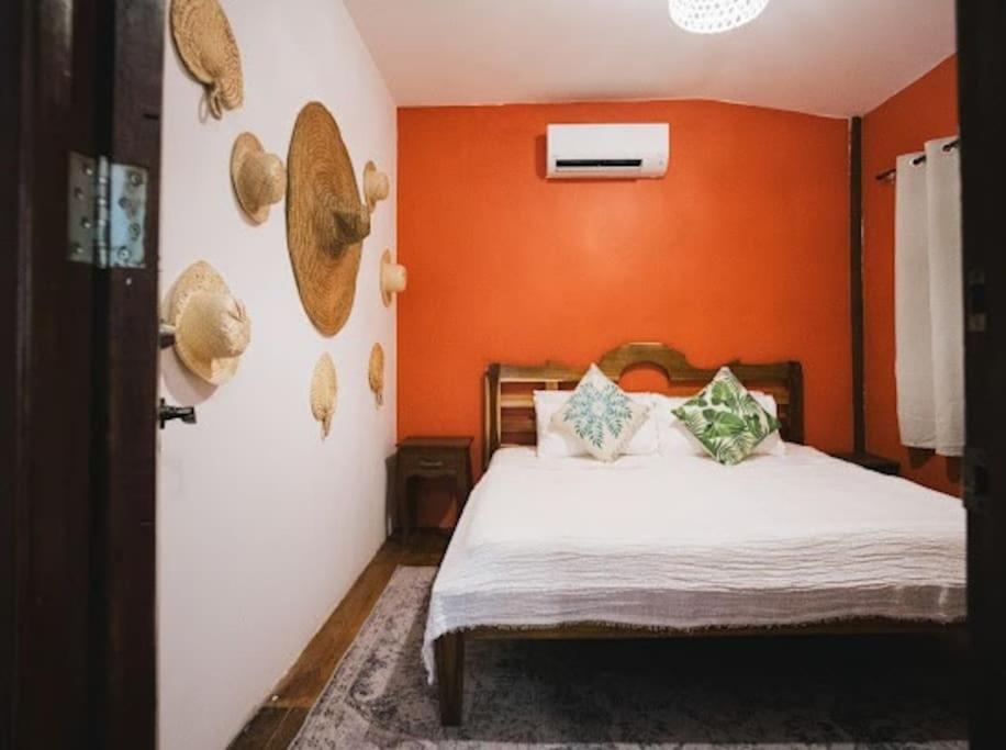 Postel nebo postele na pokoji v ubytování Malaya House
