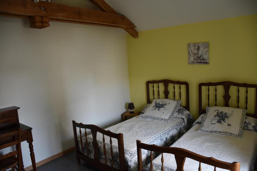 Postel nebo postele na pokoji v ubytování Le Cintrium