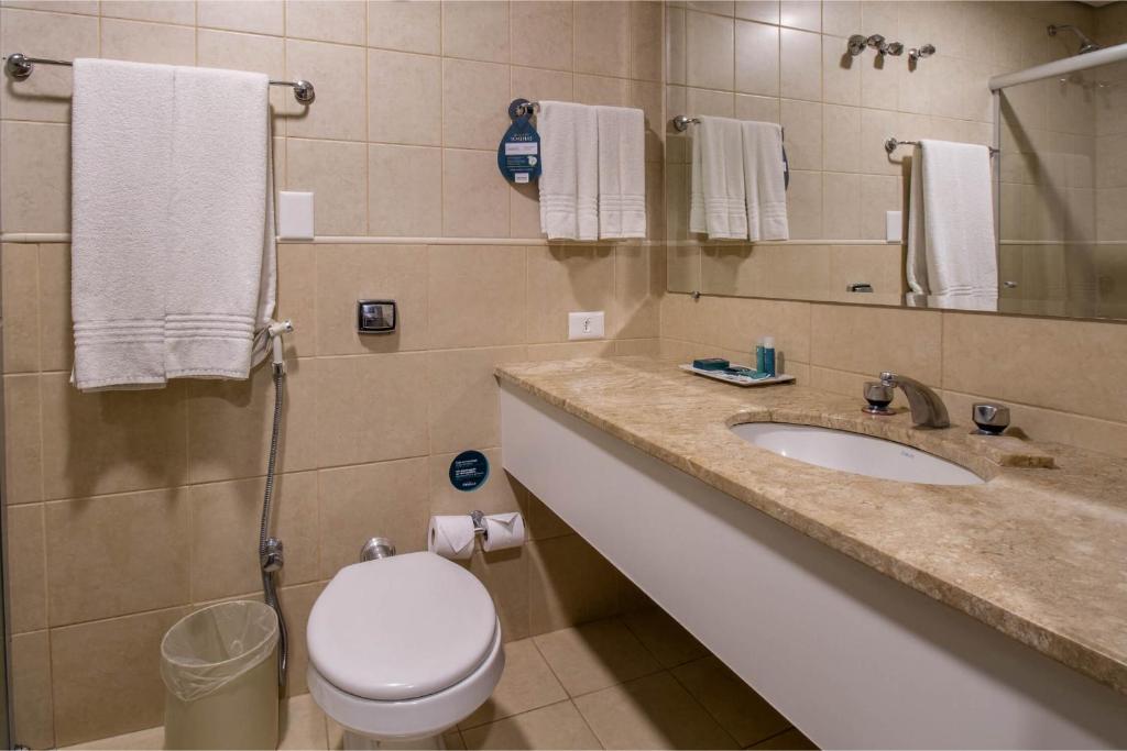 Koupelna v ubytování Hotel Deville Business Maringá