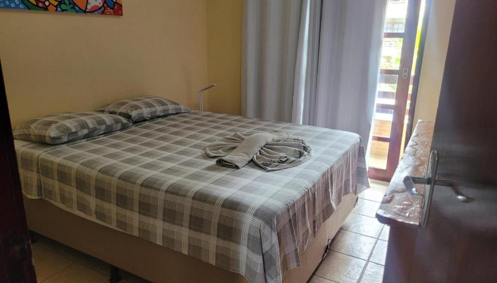 Postel nebo postele na pokoji v ubytování Cond Residencial Resort Pipa Chalés Triplex - Centro de Pipa