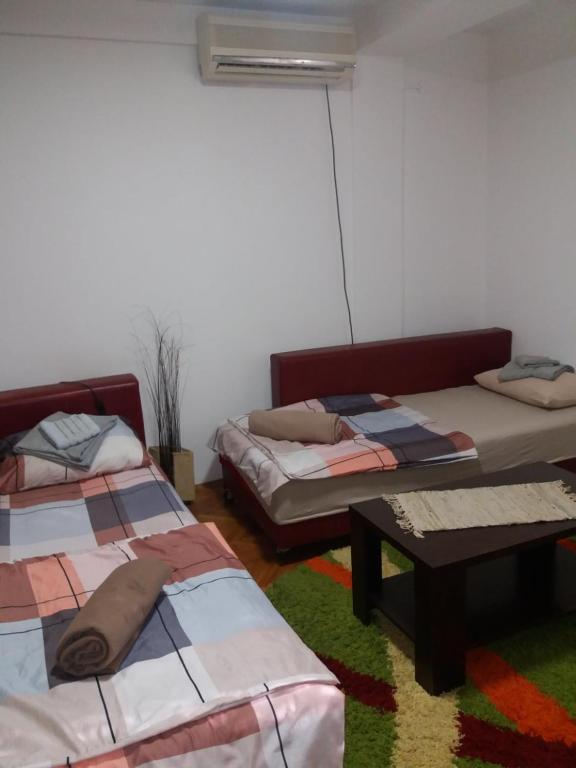 Postel nebo postele na pokoji v ubytování Apartment TiBi