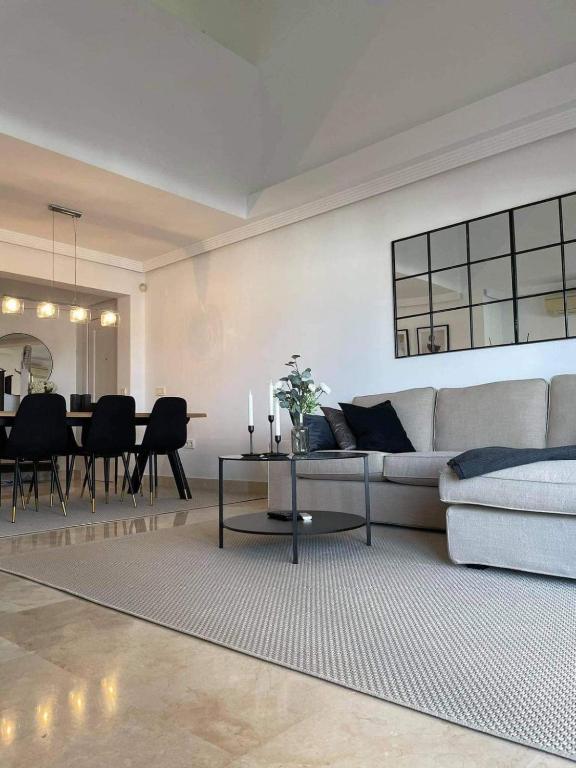 A seating area at Penthouse with sea views in Marbella