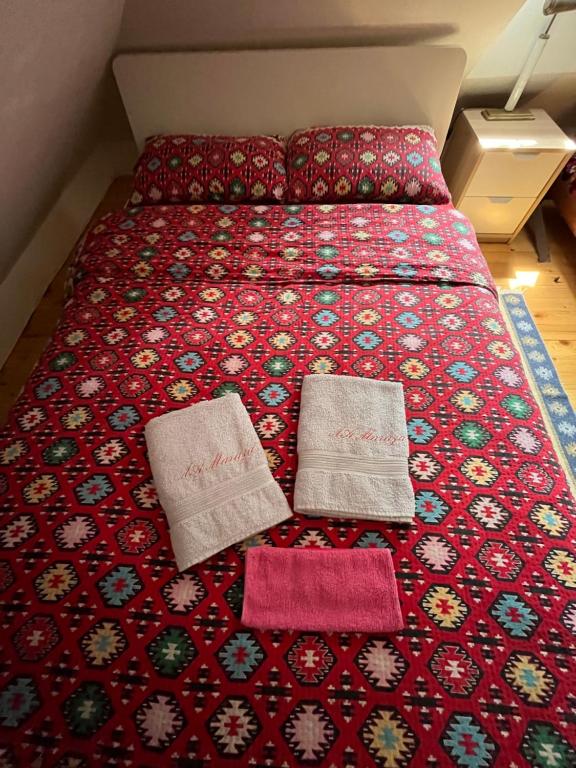 Postel nebo postele na pokoji v ubytování Apartmani LA MagaZa Banja Vrujci