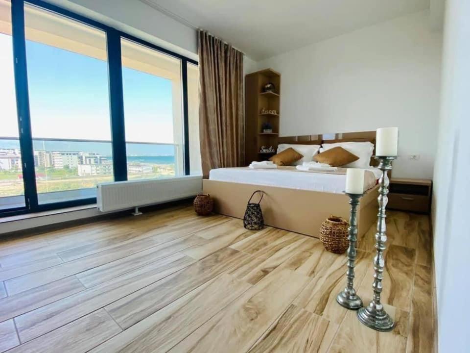 Postel nebo postele na pokoji v ubytování Bliss Apart Hotel Sea View