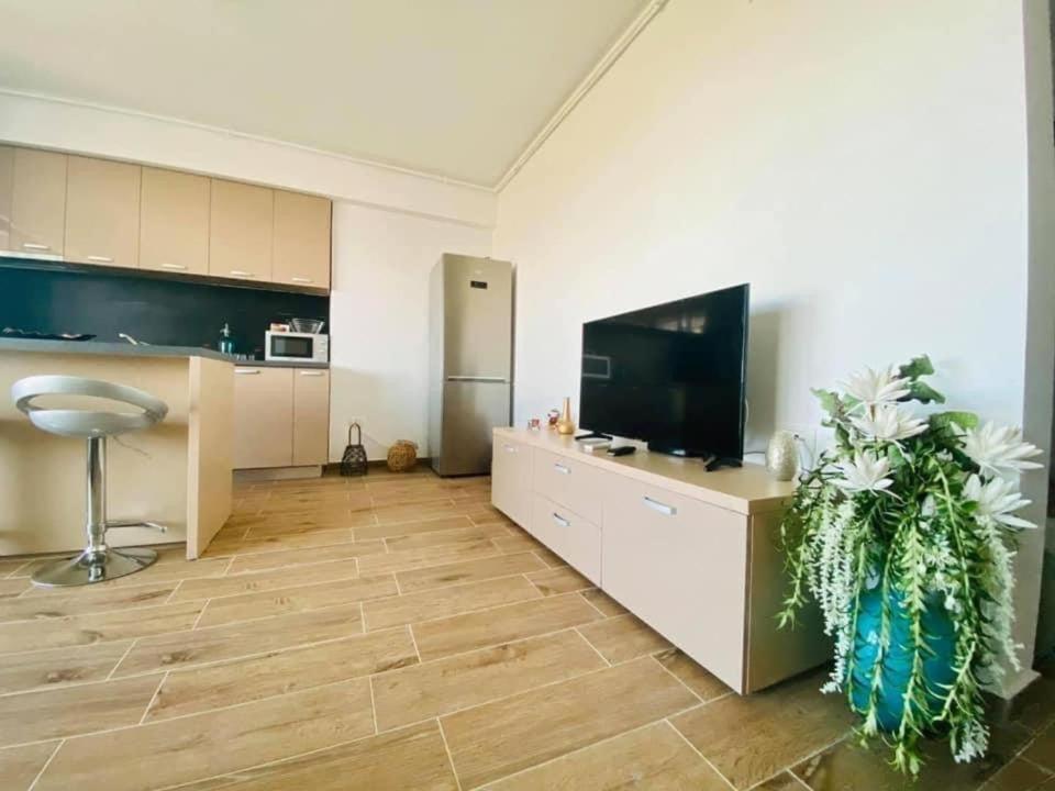 TV a/nebo společenská místnost v ubytování Bliss Apart Hotel Sea View