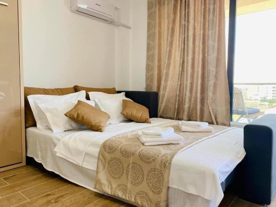 Postel nebo postele na pokoji v ubytování Bliss Apart Hotel Sea View