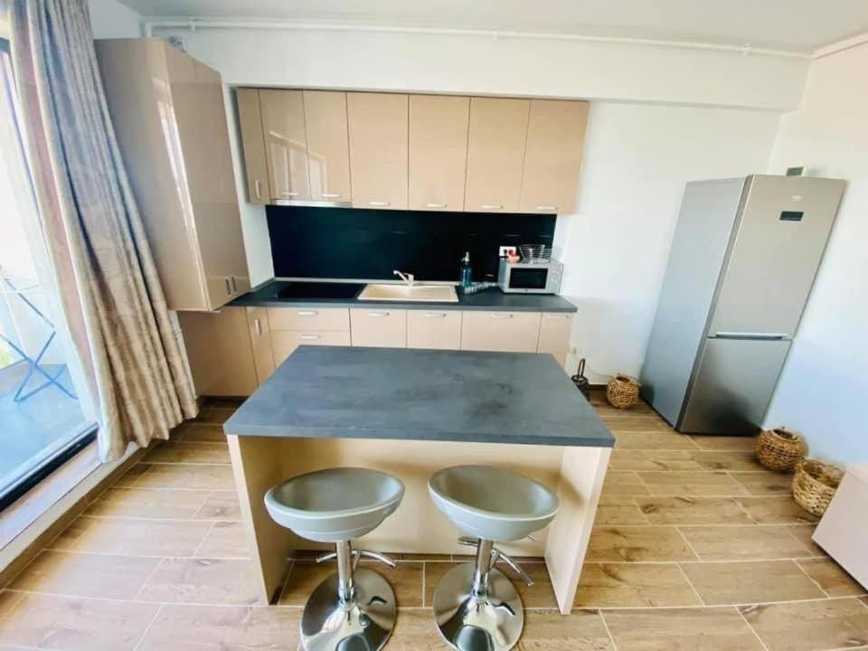 Kuchyň nebo kuchyňský kout v ubytování Bliss Apart Hotel Sea View