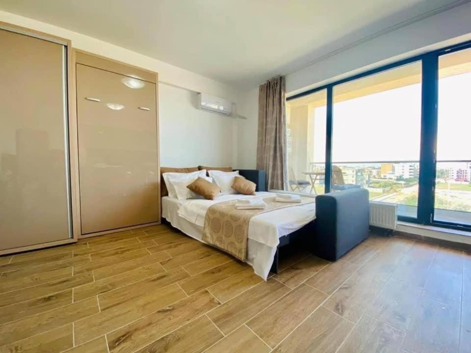 Postel nebo postele na pokoji v ubytování Bliss Apart Hotel Sea View