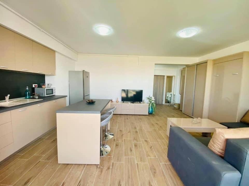 Kuchyň nebo kuchyňský kout v ubytování Bliss Apart Hotel Sea View