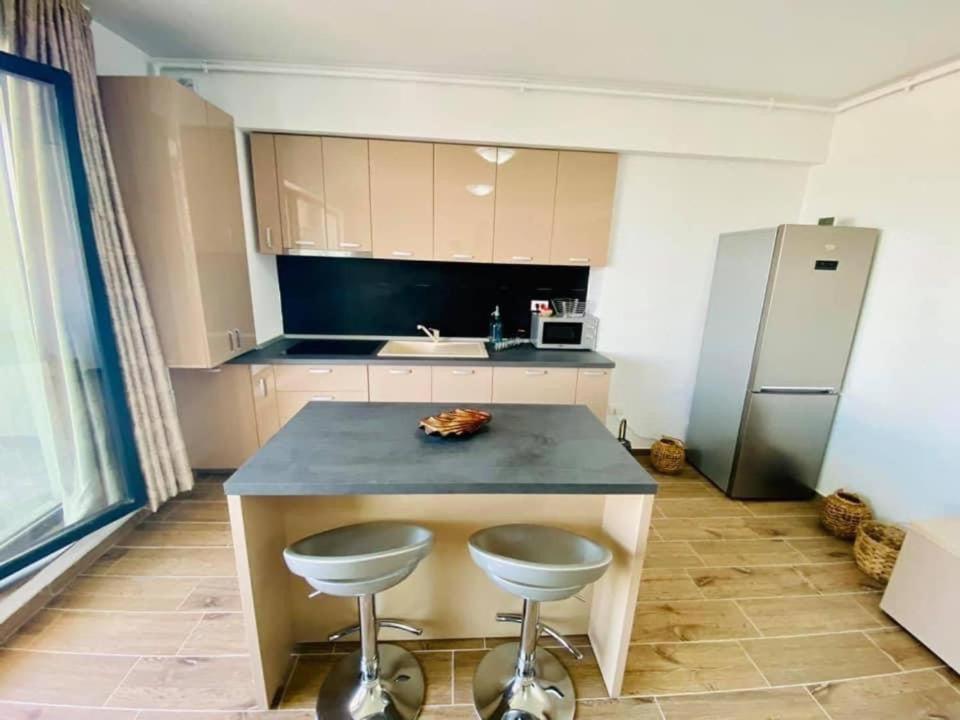 Kuchyň nebo kuchyňský kout v ubytování Bliss Apart Hotel Sea View