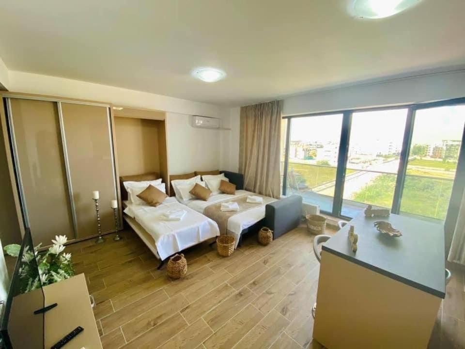 Postel nebo postele na pokoji v ubytování Bliss Apart Hotel Sea View