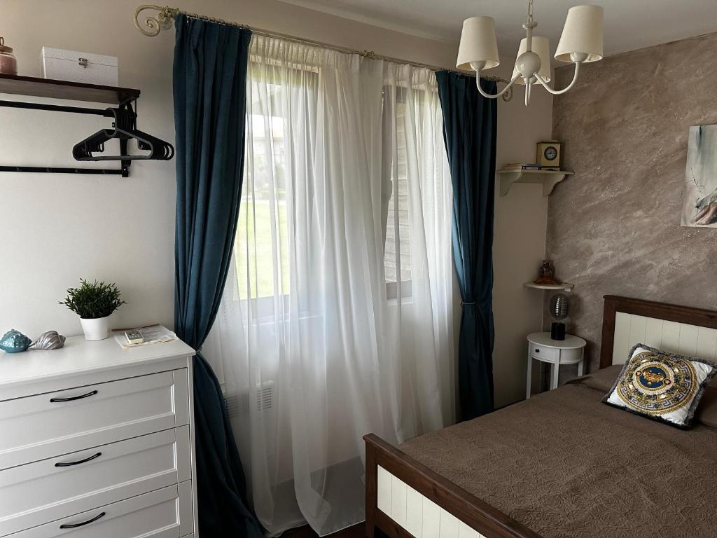 A bed or beds in a room at Sozopolis Cliffs Luxury Seaview Villa