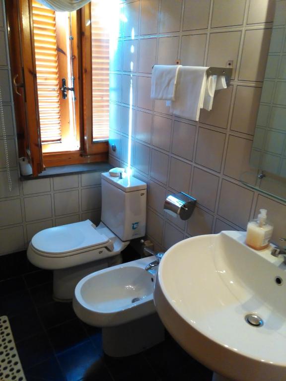 Koupelna v ubytování Albergo Villa Sorriso