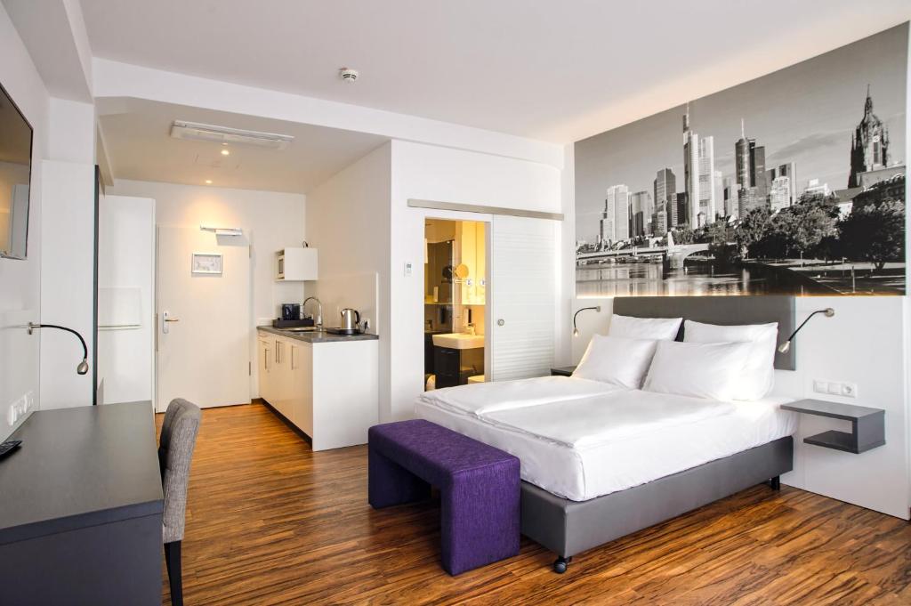 Kuchyň nebo kuchyňský kout v ubytování Tulip Inn Ludwigshafen City