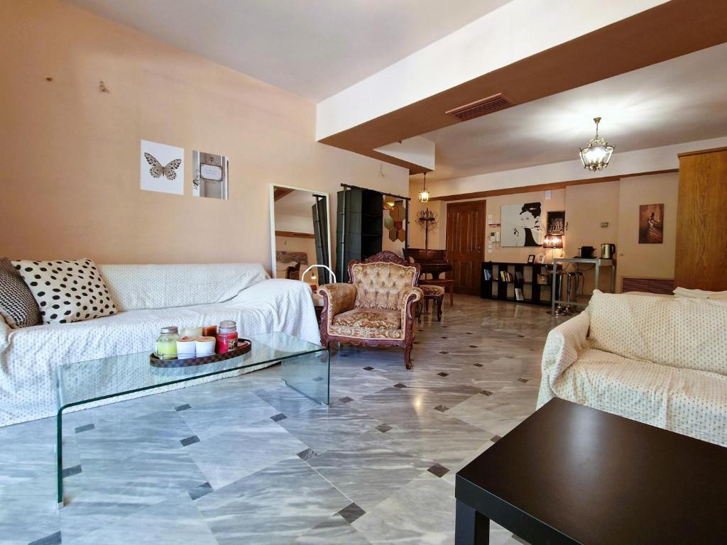 Posezení v ubytování 4 Squares Apartments - Piano Studio