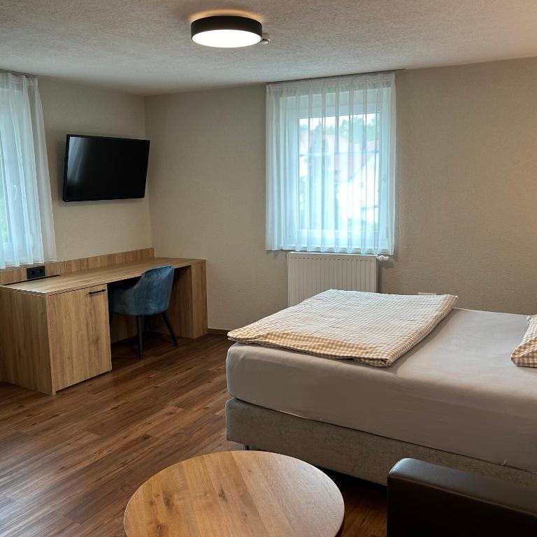 Postel nebo postele na pokoji v ubytování Braustube Wehle
