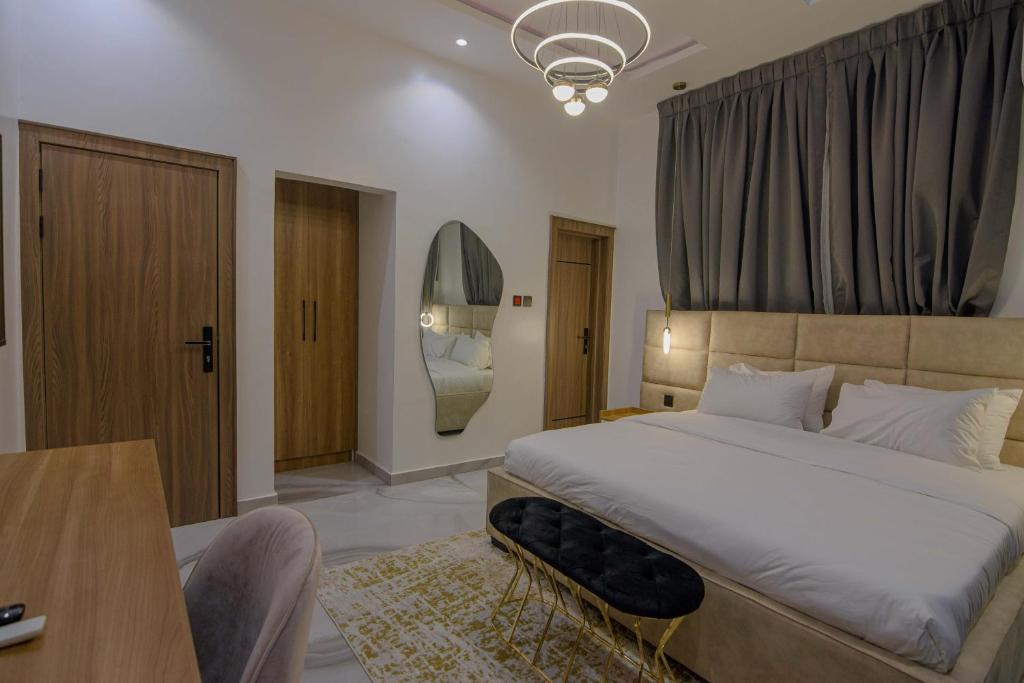 Postel nebo postele na pokoji v ubytování One90 Apartment