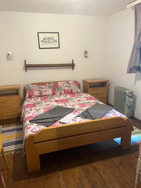 Postel nebo postele na pokoji v ubytování Apartmani LA MagaZa Banja Vrujci