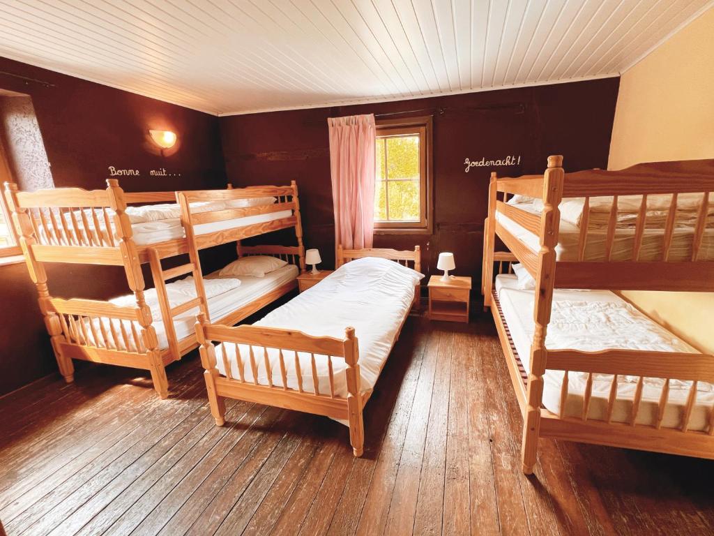 Postel nebo postele na pokoji v ubytování Au sommet de la cascade