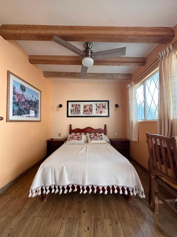 Postel nebo postele na pokoji v ubytování Casa Tecolote