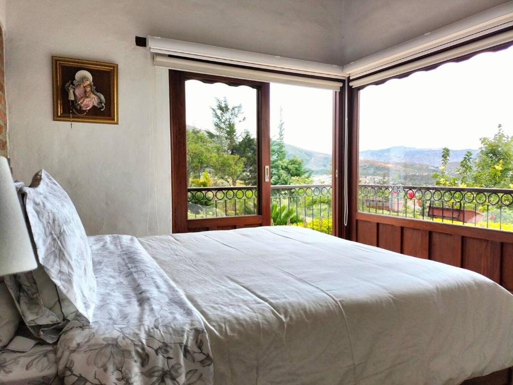 Postel nebo postele na pokoji v ubytování Cabaña en Mirador de Puente Piedra