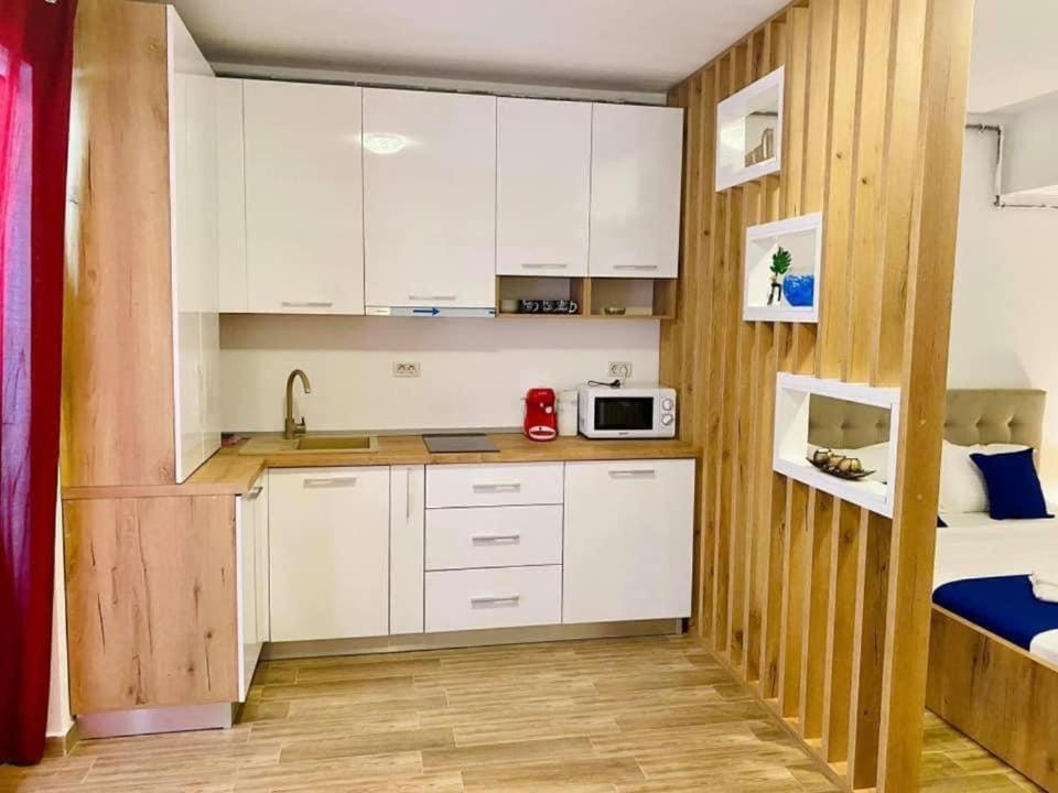 Kuchyň nebo kuchyňský kout v ubytování Bliss Apart Hotel Sea View