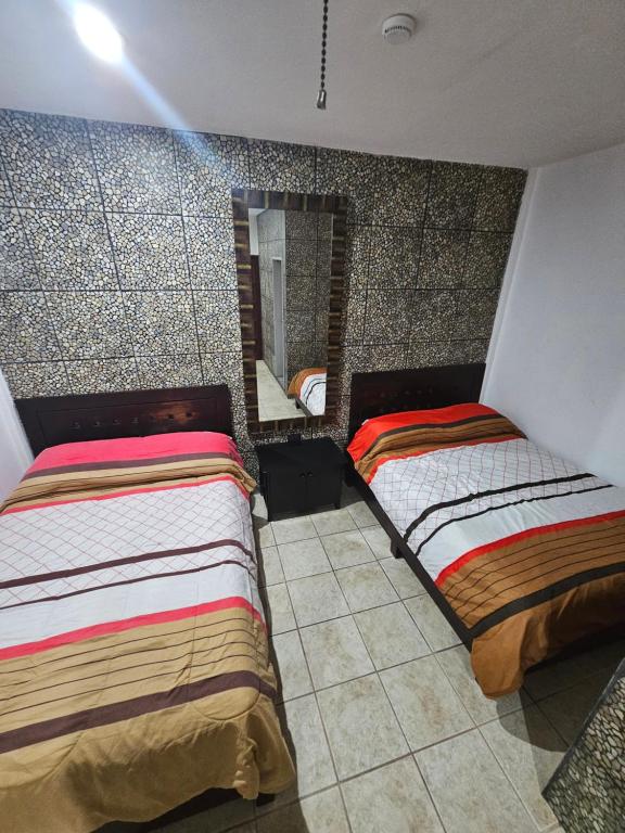 Postel nebo postele na pokoji v ubytování Hotel posada MARCAS