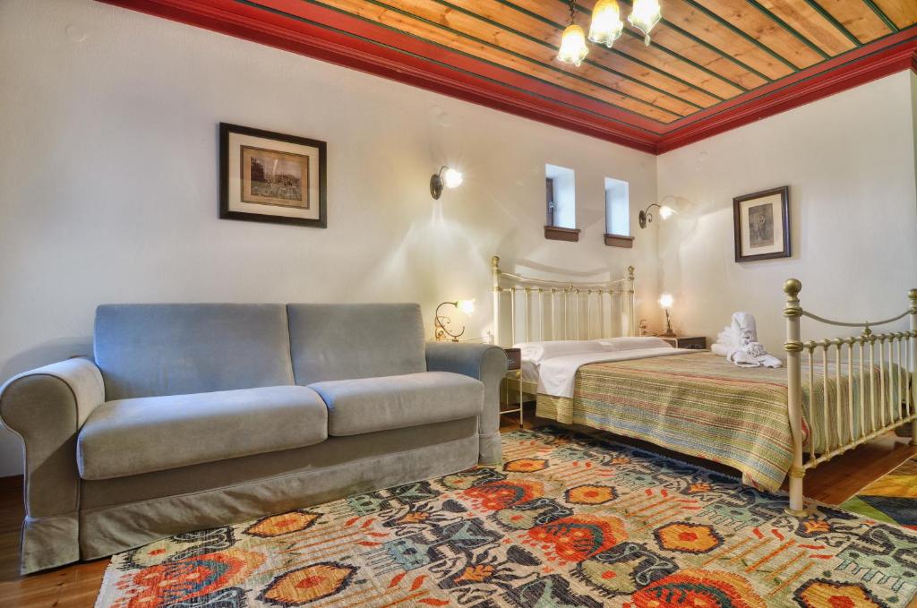 Postel nebo postele na pokoji v ubytování Melinas Boutique Hotel B&B