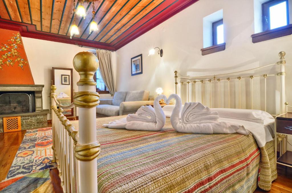 Postel nebo postele na pokoji v ubytování Melinas Boutique Hotel B&B