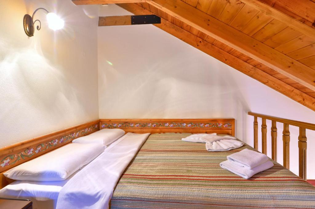 Postel nebo postele na pokoji v ubytování Melinas Boutique Hotel B&B