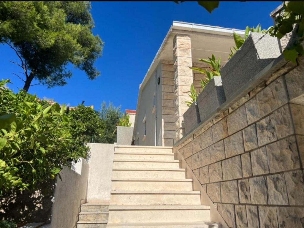 Apartments by the sea Splitska - Brac - 23366