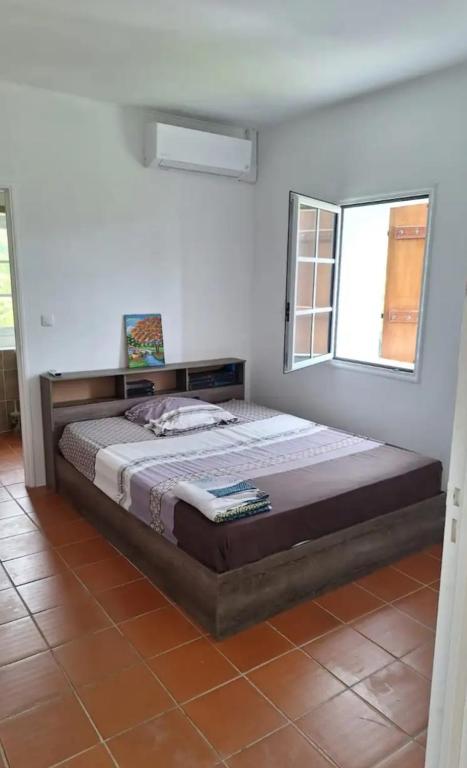 Postel nebo postele na pokoji v ubytování Chambre d'hôte