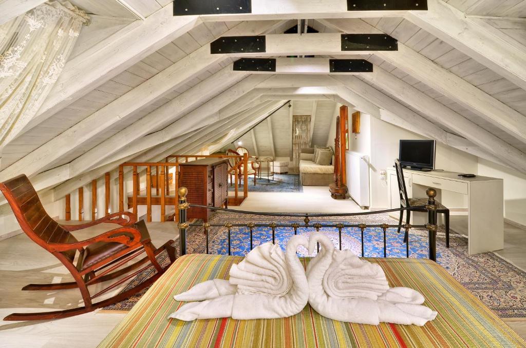 Postel nebo postele na pokoji v ubytování Melinas Boutique Hotel B&B