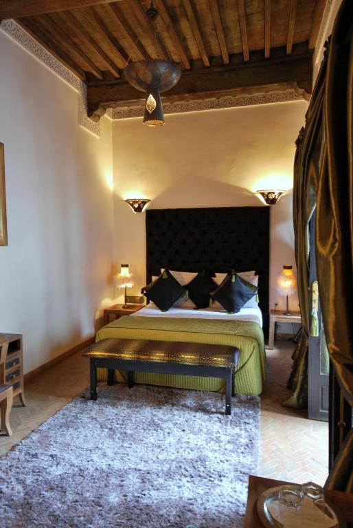 Postel nebo postele na pokoji v ubytování Riad Terra Bahia