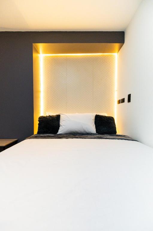Postel nebo postele na pokoji v ubytování Hotel LAX78