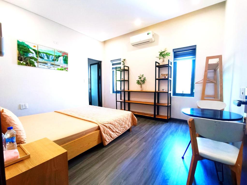 Postel nebo postele na pokoji v ubytování MyTran Homestay-HauLoan