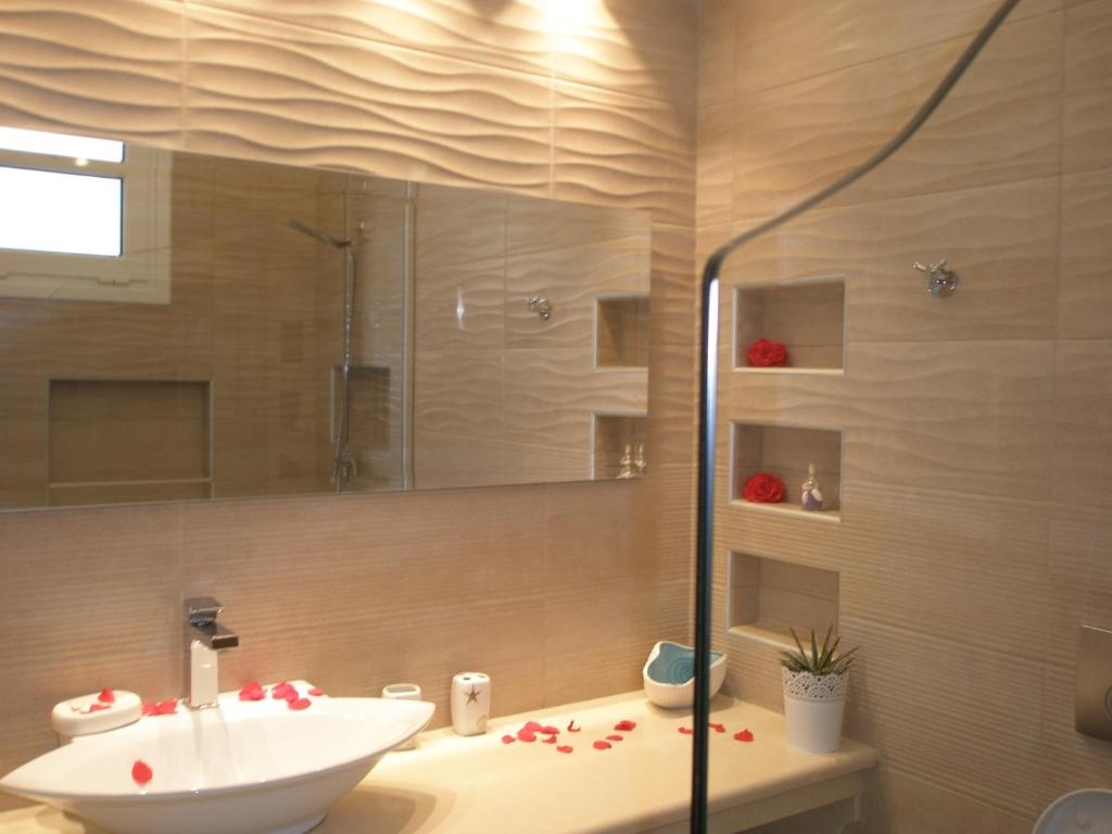 Ванная комната в WhiteSands Beach Resort