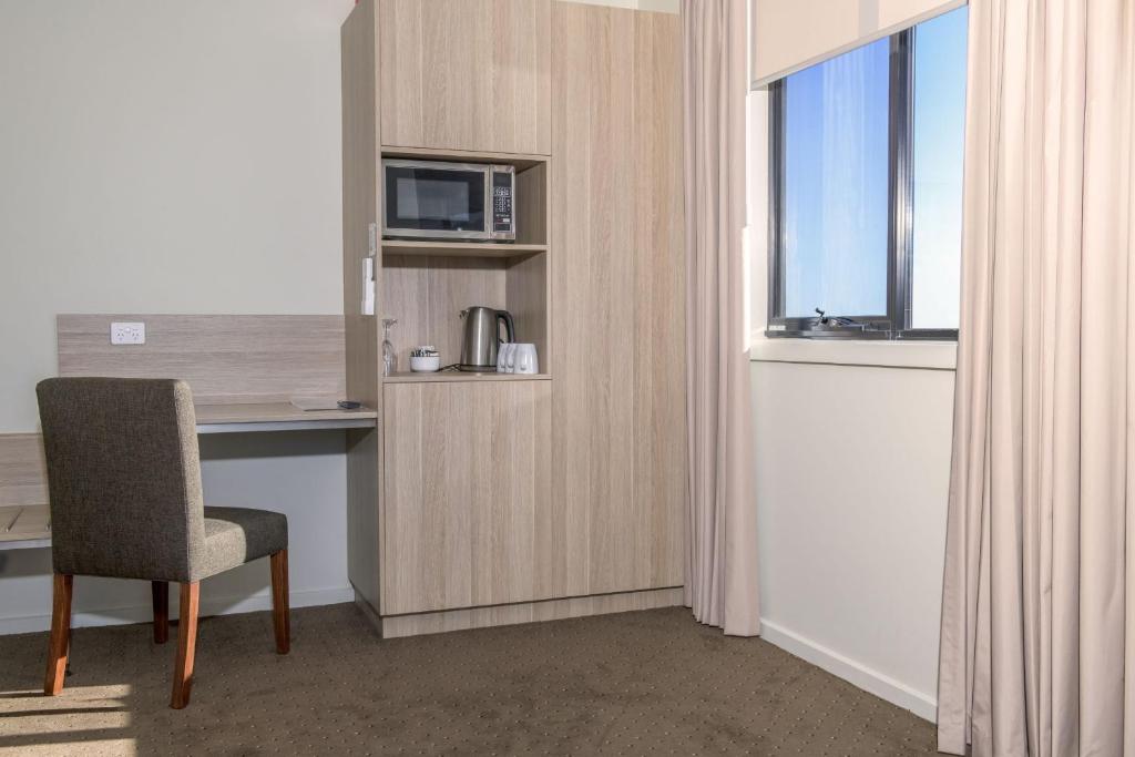 Kuchyň nebo kuchyňský kout v ubytování Elimatta Hotel