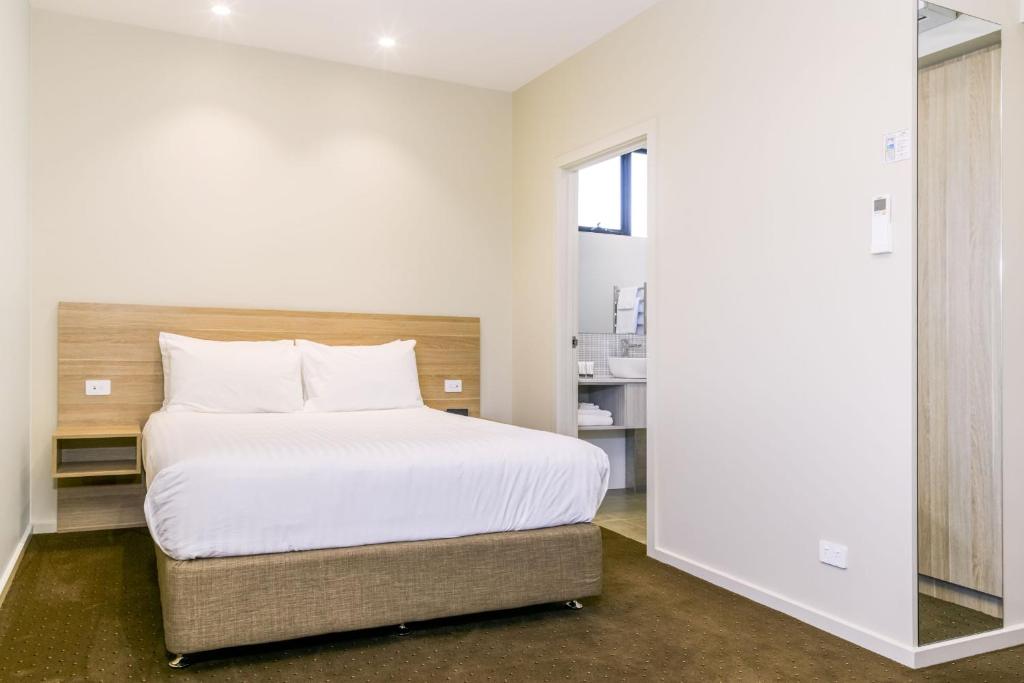 Postel nebo postele na pokoji v ubytování Elimatta Hotel