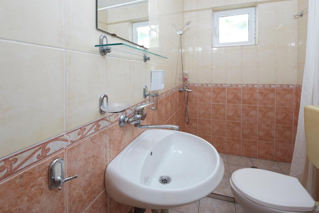 Koupelna v ubytování Family Hotel Andreev