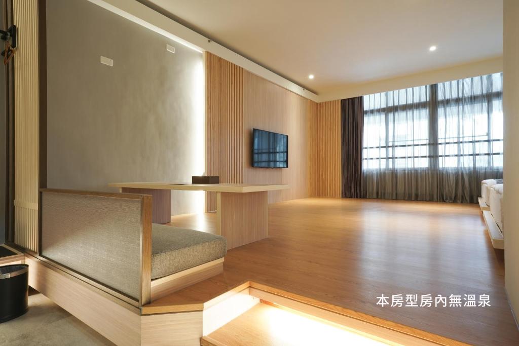 TV a/nebo společenská místnost v ubytování Hoya Hot Springs Resort, Guanziling