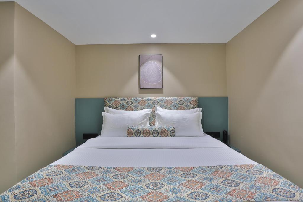 Postel nebo postele na pokoji v ubytování Hotel Serenity